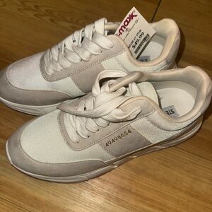 Brand new Steve Madden sneakers. Never worn. Small scuff on the front